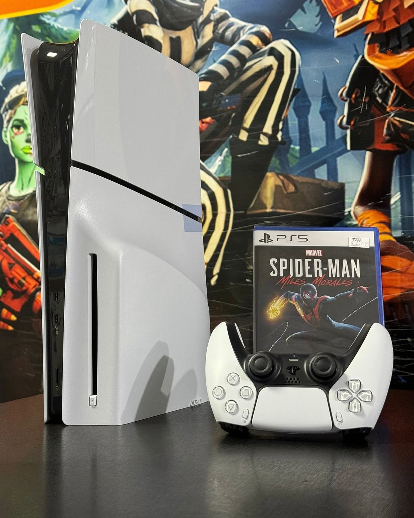 PlayStation 5 Slim com controle DualSense e jogo Spider-Man Miles Morales